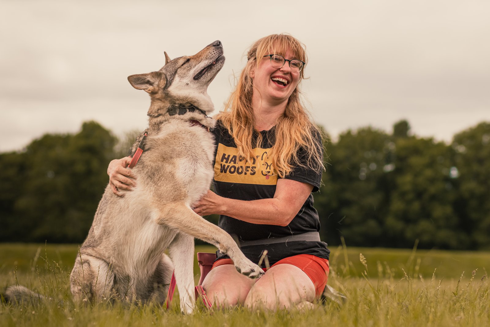 Natalia laughing with Sharga in Happy Woofs kit